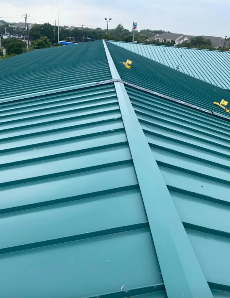 Green commercial metal roof ridge and valley for Metal Roof Repair in Basehor