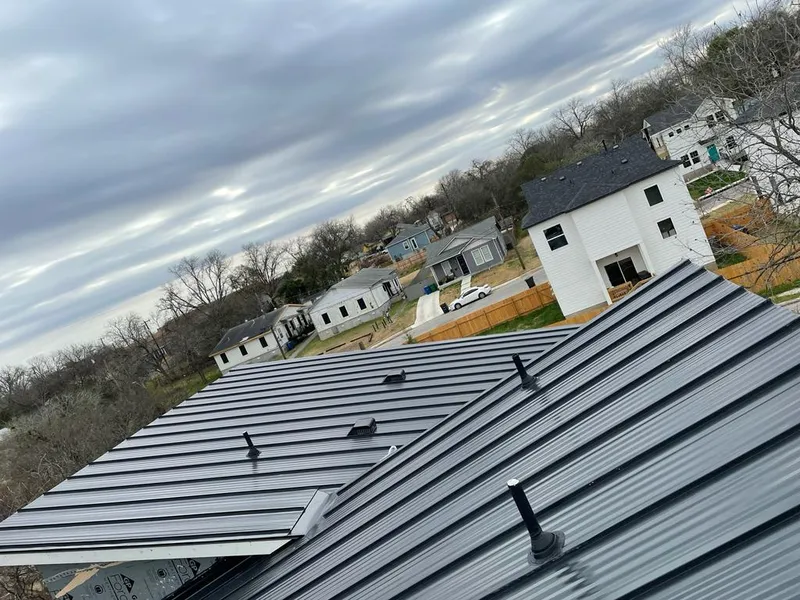 Standing seam metal roof panels with vents for Skylight Repair in Basehor